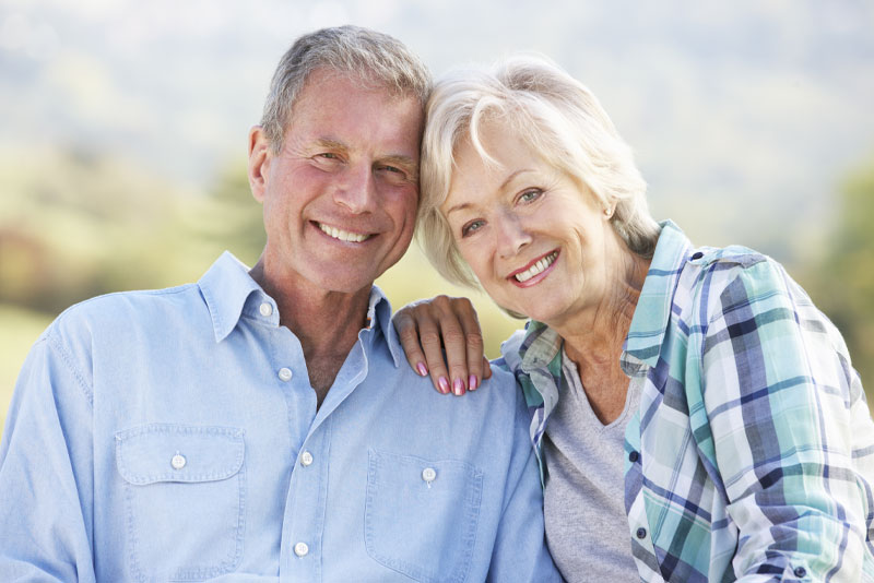 2 Dental Patients Smiling After Cosmetic Procedures