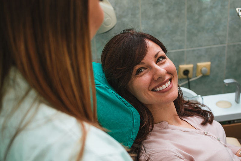 Dental Patient Smiling After Cosmetic Dentistry Procedures