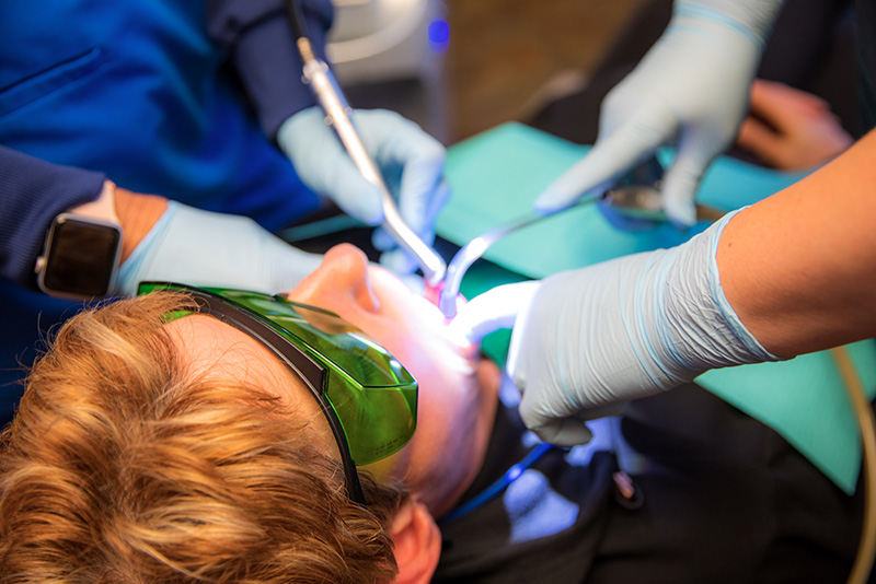 gum surgery demonstration photo in dental office