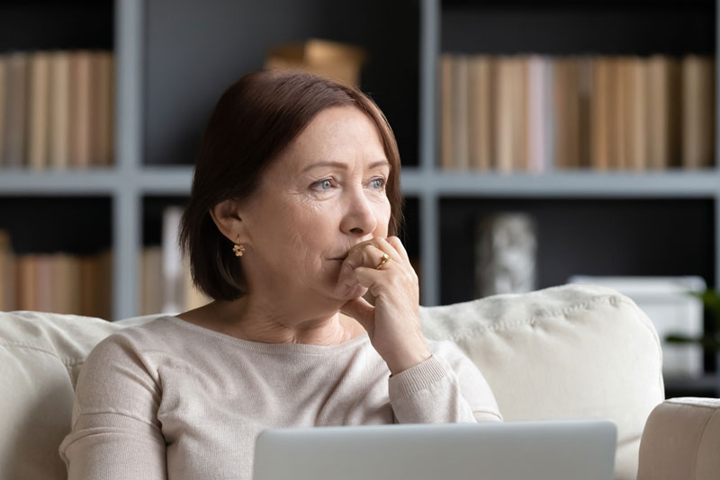 Dental Patient Wondering If She Should Get Dental Implants Or Dentures in Waco, TX